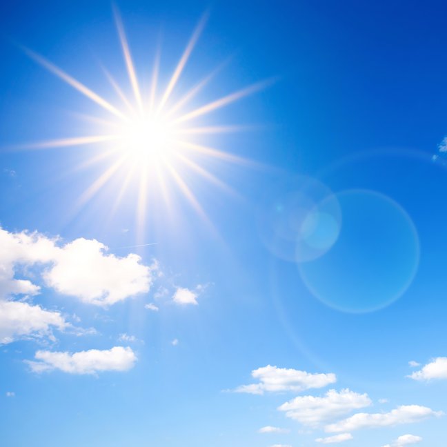 Bright sun on blue sky