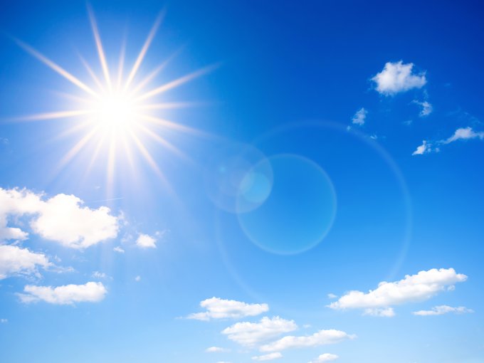 Bright sun on blue sky