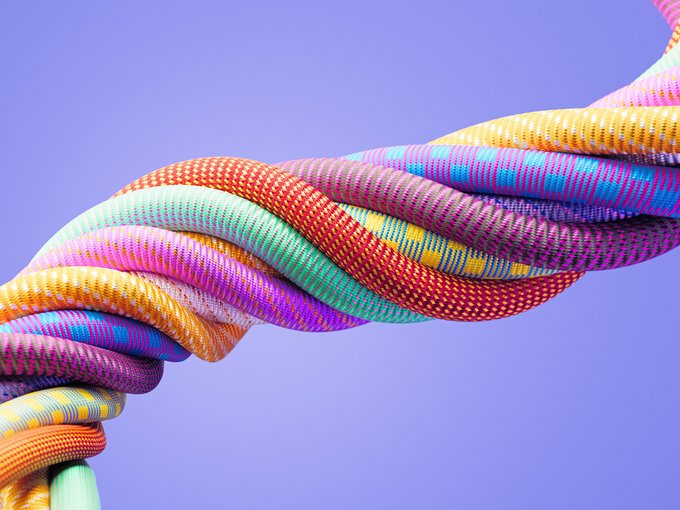 Colorful Paracords On Purple Background - Diversity And Multiculturalism Concept